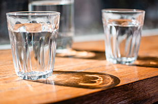 Photo of three glasses of water.