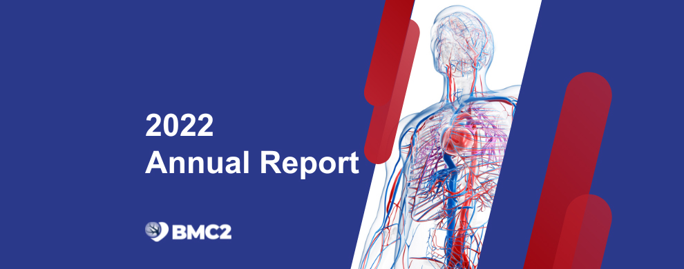 The text, "2022 Annual Report" and the BMC2 logo are in white on a bright blue background. A red and blue illustration of the cardiovascular system is on the right, accented in red.