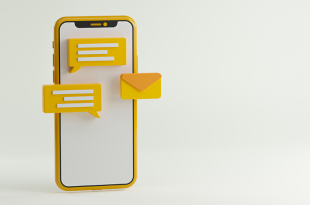 A yellow smartphone stands on a white seamless background. Yellow speech bubbles and an email icon are in front of the phone's blank white screen.