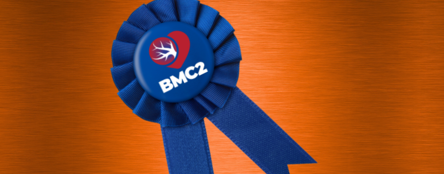 A blue ribbon is on an orange background