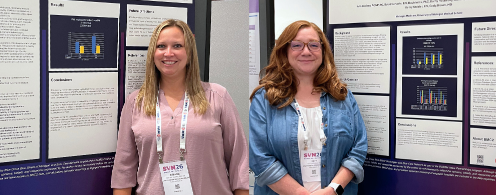 Katy and Deanna stand in front of their posters while presenting at the SVN 2026 Annual Conference in Boston